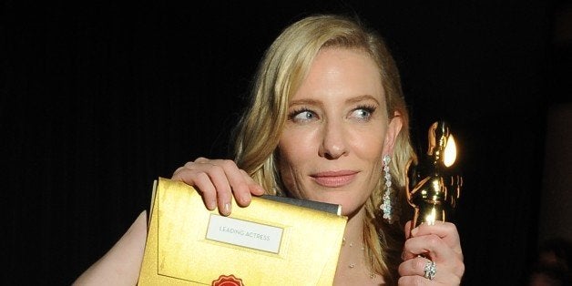 Winner for Best Actress in 'Blue Jasmine' Cate Blanchett poses with her trophy at the Governor's Ball following the 86th Acad