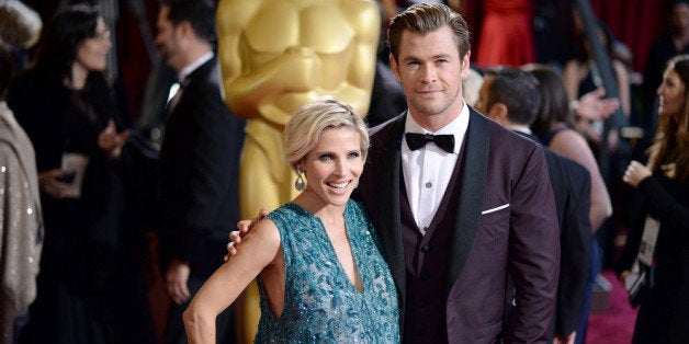 HOLLYWOOD, CA - MARCH 02: Actor Christ Hemsworth (R) and Elsa Pataky attends the Oscars held at Hollywood & Highland Center on March 2, 2014 in Hollywood, California. (Photo by Michael Buckner/Getty Images)