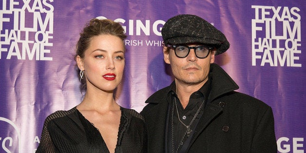 AUSTIN, TX - MARCH 06: Actors Amber Heard and Johnny Depp arrive at The Texas Film Hall Of Fame Awards presented by the Aust