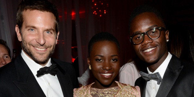 PALM SPRINGS, CA - JANUARY 04: (L-R) Actors Bradley Cooper, Lupita Nyong'o and Peter Nyong'o Jr. attend the after party for