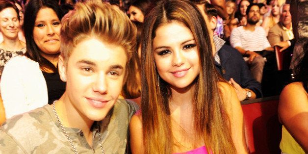 UNIVERSAL CITY, CA - JULY 22: Singer Justin Bieber and actress/singer Selena Gomez attend the 2012 Teen Choice Awards at Gibson Amphitheatre on July 22, 2012 in Universal City, California. (Photo by Kevin Mazur/TCA 2012/WireImage)