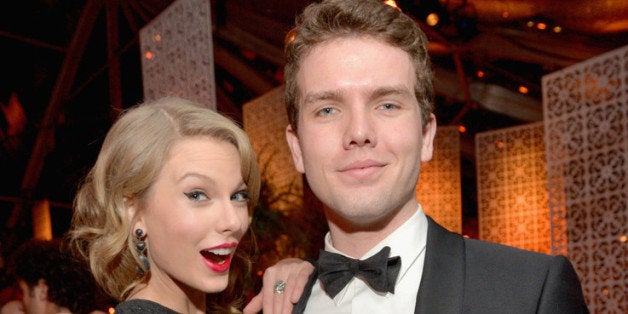 BEVERLY HILLS, CA - JANUARY 12: Singer Taylor Swift (L) and Austin Swift attend The Weinstein Company & Netflix's 2014 Golden Globes After Party presented by Bombardier, FIJI Water, Lexus, Laura Mercier, Marie Claire and Yucaipa Films at The Beverly Hilton Hotel on January 12, 2014 in Beverly Hills, California. (Photo by Charley Gallay/Getty Images for The Weinstein Company)