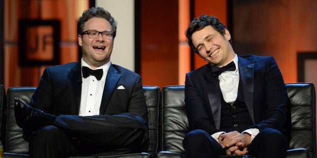 CULVER CITY, CA - AUGUST 25: Roast Master Seth Rogen and roastee James Franco onstage during The Comedy Central Roast of James Franco at Culver Studios on August 25, 2013 in Culver City, California. The Comedy Central Roast Of James Franco will air on September 2 at 10:00 p.m. ET/PT. (Photo by Jason Merritt/Getty Images for Comedy Central)