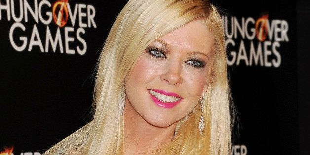 HOLLYWOOD, CA- FEBRUARY 11: Actress Tara Reid attends the Los Angeles Premiere of 'The Hungover Games' at TCL Chinese Theatre on February 11, 2014 in Hollywood, California.(Photo by Jeffrey Mayer/WireImage)