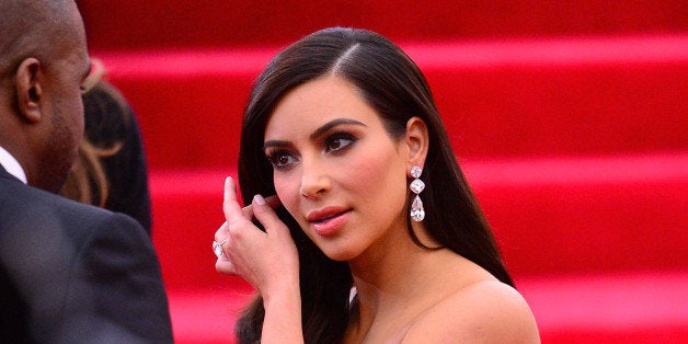 NEW YORK, NY - MAY 05: Kim Kardashian attends the 'Charles James: Beyond Fashion' Costume Institute Gala at the Metropolitan Museum of Art on May 5, 2014 in New York City. (Photo by James Devaney/GC Images)