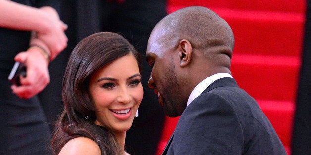 NEW YORK, NY - MAY 05: Kim Kardashian and Kanye West attend the 'Charles James: Beyond Fashion' Costume Institute Gala at th
