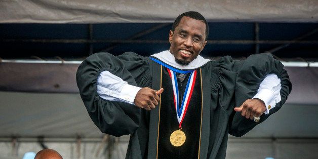 WASHINGTON, DC - MAY 10:Sean Combs does a little dance across the stage while he delivers his keynote address during Howard University's commencement ceremonies on May, 10, 2014 in Washington, DC.(Photo by Bill O'Leary/The Washington Post via Getty Images)