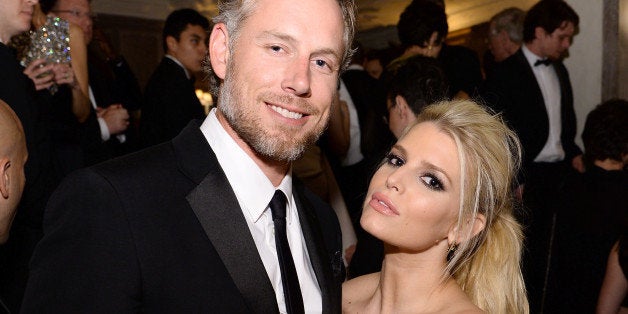 WASHINGTON, DC - MAY 03: Eric Johnson (L) and Jessica Simpson attend the Bloomberg & Vanity Fair cocktail reception following the 2014 WHCA Dinner at Villa Firenze on May 3, 2014 in Washington, DC. (Photo by Dimitrios Kambouris/VF14/WireImage)