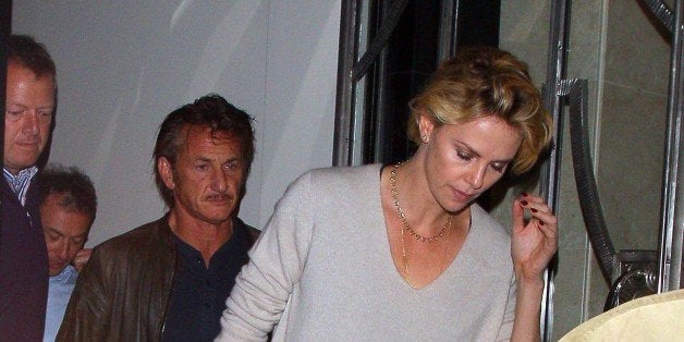 LONDON, UNITED KINGDOM - MAY 28: Charlize Theron and Sean Penn leaving Claridges Hotel on May 28, 2014 in London, England. (P