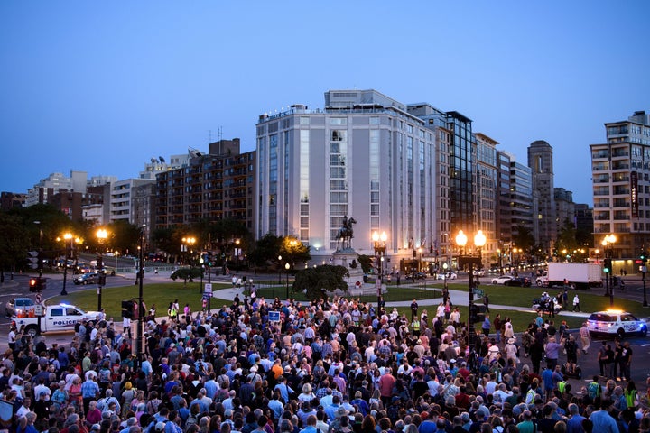 People with the "Reclaiming Jesus Declaration" leave the National City Christian Church to march to the White House for a vigil on May 24.