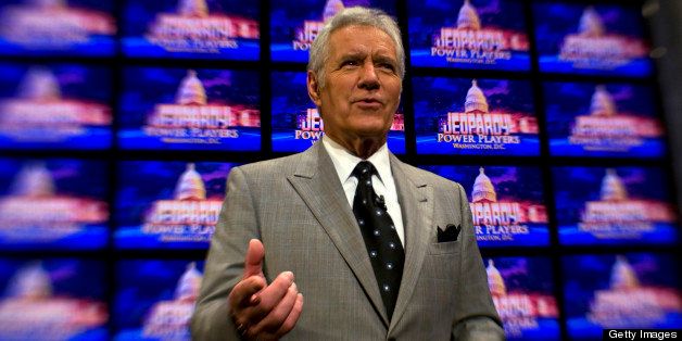 WASHINGTON, DC - APRIL 21: Alex Trebek poses on the set of his game show Jeopardy on April 21, 2012. Mr. Trebek was in Washington for his 'Jeopardy! Power Players Week' shows which were being filmed inside DAR Constitution Hall. (Photo by Tracy A. Woodward/The Washington Post via Getty Images) 
