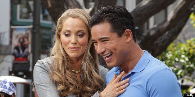 LOS ANGELES, CA - APRIL 04: Elizabeth Berkley (L) and Mario Lopez visit Extra at The Grove on April 4, 2011 in Los Angeles, California. (Photo by Noel Vasquez/Getty Images for Extra)
