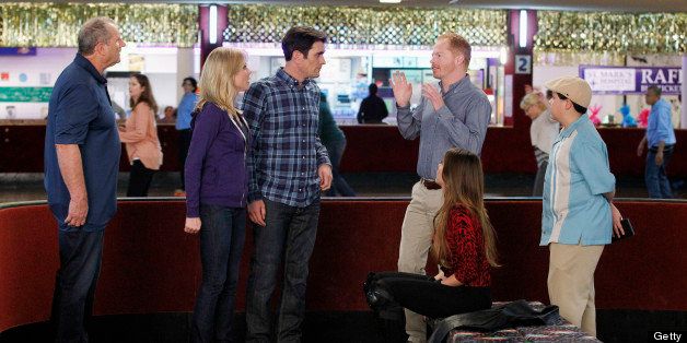 MODERN FAMILY - 'My Hero' - Mitch's ex-boyfriend, Teddy, a very personable and successful doctor, invites the whole family to a fundraising event at the local roller rink, and they all run circles around each other as Cam tries to play it cool around Teddy, Claire avoids talking to Jay about inheriting his closet business, Phil teaches Gloria how to skate in spectacular fashion, Haley helps Alex talk to some cute boys, and amidst all the chaos Manny and Luke try to figure out whom they'll pick in their family for their 'My Hero' essay assignment, on 'Modern Family,' WEDNESDAY, MAY 8 (9:00-9:31 p.m., ET), on the ABC Television Network. (Photo by Peter 'Hopper' Stone/ABC via Getty Images) ED O'NEILL, JULIE BOWEN, TY BURRELL, JESSE TYLER FERGUSON, SOFIA VERGARA, RICO RODRIGUEZ