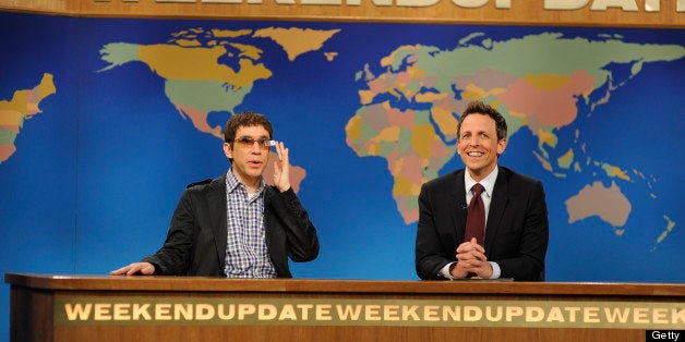 SATURDAY NIGHT LIVE -- 'Zach Galifianakis' Episode 1639 -- Pictured: (l-r) Fred Armisen with Seth Meyers during a skit on May