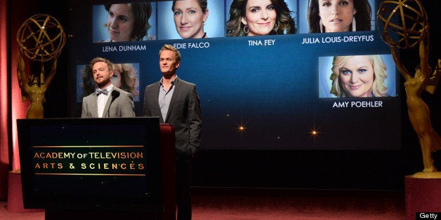 NORTH HOLLYWOOD, CA - JULY 18: Actors Aaron Paul (L) and Neil Patrick Harris announce the nominees for the Outstanding Lead Actress in a Comedy Series Award during the 65th Primetime Emmy Awards nominations at the Television Academy's Leonard H. Goldenson Theatre on July 18, 2013 in North Hollywood, California. (Photo by Alberto E. Rodriguez/Getty Images)