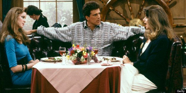 CHEERS -- 'Sisterly Love' Episode 21 -- Air Date 04/27/1989 -- Pictured: (l-r) Marcia Cross as Susan Howe, Ted Danson as Sam Malone, Kirstie Alley as Rebecca Howe -- (Photo by: NBC/NBCU Photo Bank via Getty Images)