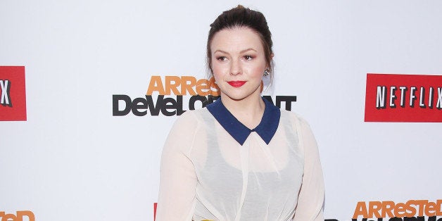 HOLLYWOOD, CA - APRIL 29: Amber Tamblyn arrives at Netflix's Los Angeles premiere of 'Arrested Development' season 4 held at