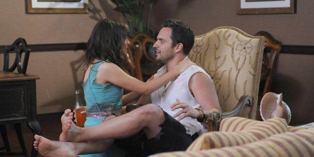 NEW GIRL: Zooey Deschanel and Jake Johnson (R) in the 'All In' season premiere episode of NEW GIRL airing Tuesday, Sept. 17, 2013 (9:00-9:30 PM ET/PT) on FOX. (Photo by FOX via Getty Images)