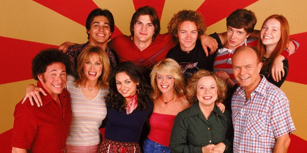 THAT '70S SHOW - Top row L-R: Wilmer Valderrama, Ashton Kutcher, Danny Masterson, Topher Grace, Laura Prepon. Center L-R: Don
