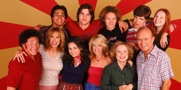 THAT '70S SHOW - Top row L-R: Wilmer Valderrama, Ashton Kutcher, Danny Masterson, Topher Grace, Laura Prepon. Center L-R: Don Stark, Tanya Roberts, Mila Kunis, Lisa Robin Kelly, Debra Jo Rupp, Kurtwood Smith. (Photo by FOX via Getty Images)