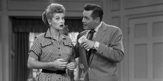 American actress Lucille Ball (1911 - 1989) (as Lucy Ricardo) and her husband, Cuban actor Desi Arnaz (1917 - 1986) (as Ricky Ricardo) talk in an episode of 'I Love Lucy,' Los Angeles, California, September 21, 1954. (Photo by CBS Photo Archive/Getty Images)