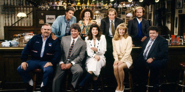 CHEERS -- 'One for the Road' Episode 25 -- Aired 5/20/93 -- Pictured: (Back row l-r) Ted Danson as Sam Malone, Rhea Perlman as Carla Tortelli, Woody Harrelson as Woody Boyd, Kelsey Grammer as Dr. Frasier Crane (front row l-r) John Ratzenberger as Cliff Clavin, Tom Berenger as Don Santry, Kirsty Alley as Rebecca Howe, Shelley Long as Diane Chambers, George Wendt as Norm Peterson (Photo by Paul Drinkwater/NBC/NBCU Photo Bank via Getty Images)