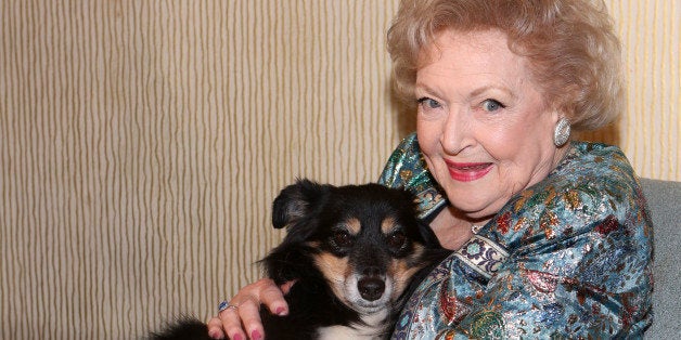 BEVERLY HILLS, CA - OCTOBER 5: Hero Dog Cassidy (L) and actress Betty White (R) pose during the American Humane Association H