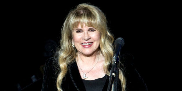 BIRMINGHAM, ENGLAND - SEPTEMBER 29: Stevie Nicks of Fleetwood Mac performs on stage at LG Arena on September 29, 2013 in Birmingham, England. (Photo by Steve Thorne/Redferns via Getty Images)