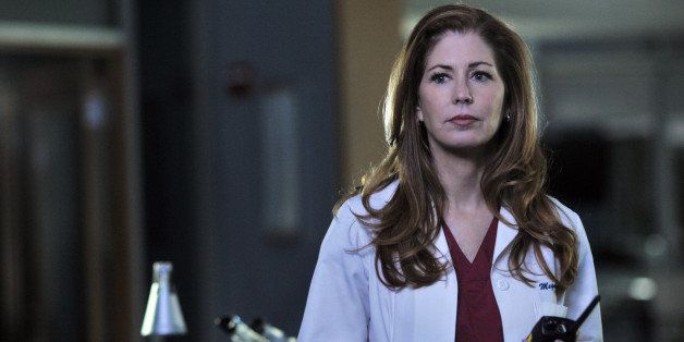 BODY OF PROOF - 'Dark City' - When a plane crashes in Philadelphia due to a gunman opening fire while aloft, the entire team of Megan, Kate, Tommy, Adam, Curtis, Ethan, Riley and Stafford must go into disaster mode. Since the crash hits the city's main power grid, Megan must conduct autopsies on the victims during frequent blackouts, but then one of the bodies goes missing. Meanwhile, Tommy and Adam are in a serious car accident while trying to investigate, on 'Body of Proof' airs TUESDAY, MAY 7 (10:01-11:00 p.m. ET) on the ABC Television Network. (Photo by Richard Foreman/ABC via Getty Images)DANA DELANY