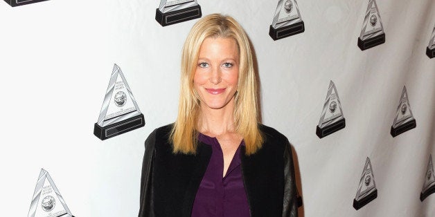 BEVERLY HILLS, CA - OCTOBER 17: Actress Anna Gunn arrives at the 2013 Media Access Awards at The Beverly Hilton Hotel on Oct