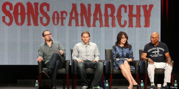 BEVERLY HILLS, CA - AUGUST 02: (L-R) Creator/Executive Producer Kurt Sutter, actors Charlie Hunnam and Katey Sagal, and Executive Producer Paris Barclay speak onstage during the 'Sons of Anarchy' panel discussion at the FX portion of the 2013 Summer Television Critics Association tour - Day 10 at The Beverly Hilton Hotel on August 2, 2013 in Beverly Hills, California. (Photo by Frederick M. Brown/Getty Images)