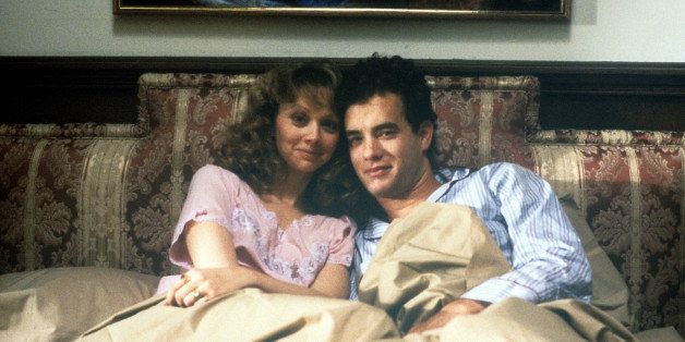 Shelley Long sits in bed with Tom Hanks in a scene from the film 'The Money Pit', 1986. (Photo by Universal/Getty Images)