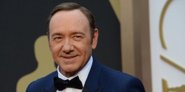 Actor Kevin Spacey arrives on the red carpet for the 86th Academy Awards on March 2nd, 2014 in Hollywood, California. AFP PHO