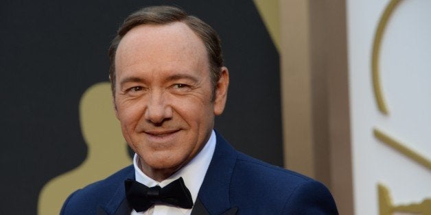 Actor Kevin Spacey arrives on the red carpet for the 86th Academy Awards on March 2nd, 2014 in Hollywood, California. AFP PHOTO / Robyn BECK (Photo credit should read ROBYN BECK/AFP/Getty Images)