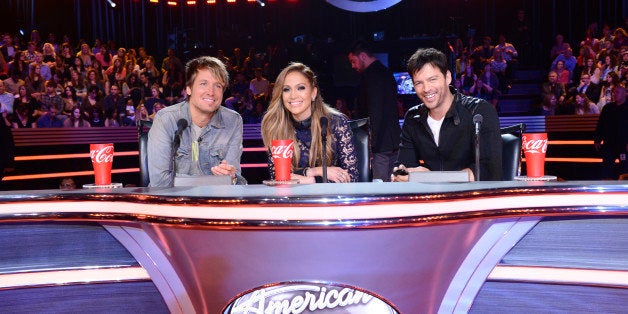 HOLLYWOOD, CA - FEBRUARY 26: (L-R) Judges Keith Urban, Jennifer Lopez, and Harry Connick Jr. are seen on FOX's 'American Idol' Season 13 Top 13 Perform Live Show on February 26, 2014 in Hollywood, California. (Photo by FOX via Getty Images)