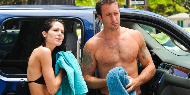 HONOLULU - JULY 27: 'Kanalua'--Catherine (Michelle Borth) and McGarrett (Alex O'Loughlin) reflect and get dressed after participating in traditional Hawaiian paddle-out following a shocking death, on HAWAII FIVE-0, Monday, Oct. 1 (10:00-11:00 PM, ET/PT) on the CBS Television Network. (Photo by Norman Shapiro/CBS via Getty Images) 