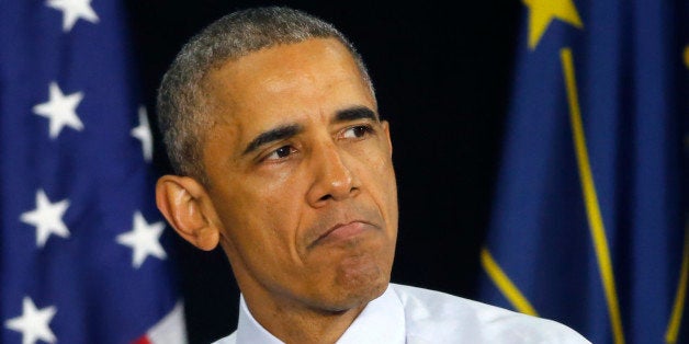 President Barack Obama pauses while speaking at Concord Community High School Wednesday, June 1, 2016, in Elkhart, Ind. (AP Photo/Charles Rex Arbogast)