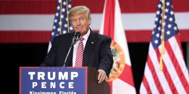 Republican presidential candidate Donald Trump addresses supporters during a campaign rally at Silver Spurs Arena inside the