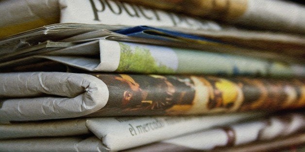 Colorful newspapers. A texture has been applied to the image