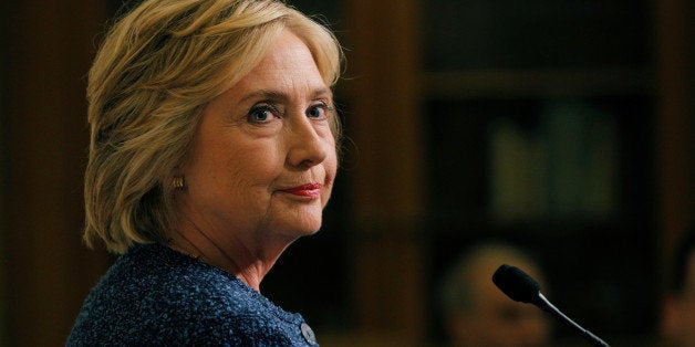 U.S. Democratic presidential candidate Hillary Clinton speaks to reporters after holding a "National Security Working Session