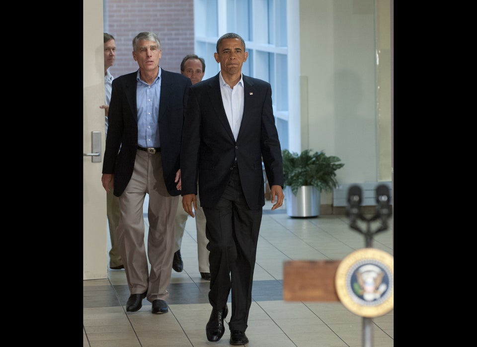 US President Barack Obama arrives alongs