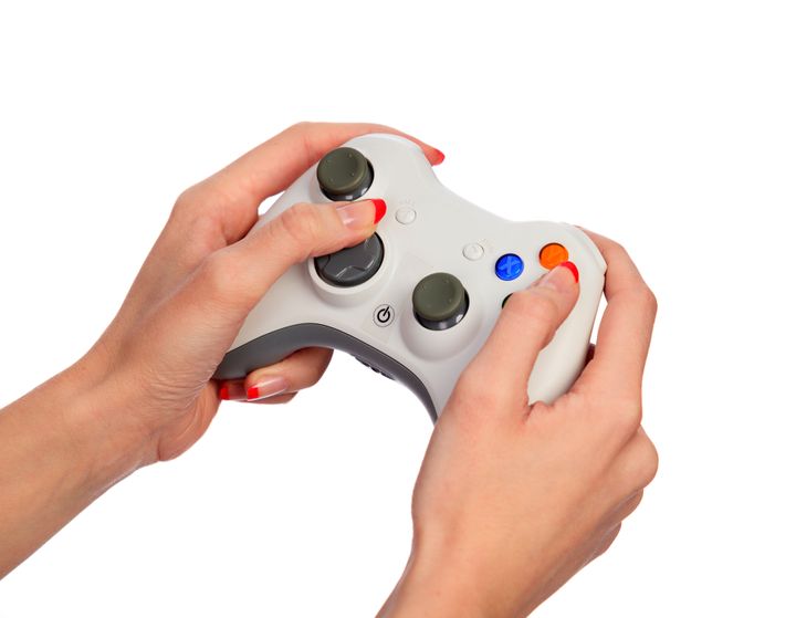 female hands with a gamepad....