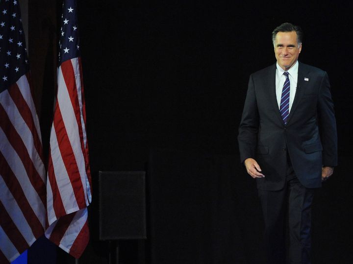 Republican presidential candidate Mitt Romney arrives on stage on election night November 7, 2012 in Boston, Massachusetts, moments before conceding defeat to US President Barack Obama in the 2012 US presidential election. AFP PHOTO/EMMANUEL DUNAND (Photo credit should read EMMANUEL DUNAND/AFP/Getty Images)