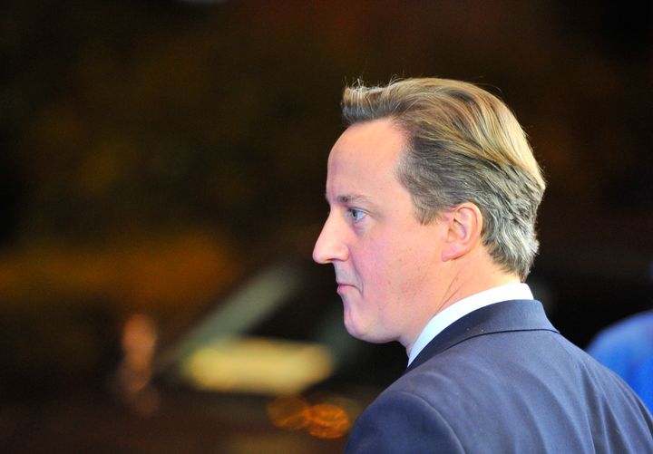 British Prime Minister David Cameron leaves the EU Headquarters, on November 23, 2012 in Brussels, after a two-day European Union leaders summit called to agree a hotly-contested trillion-euro budget through 2020. EU Council President Herman Van Rompuy said today that an EU budget deal was within reach early next year, after a two-day summit collapsed without agreement. AFP PHOTO / GEORGES GOBET (Photo credit should read GEORGES GOBET/AFP/Getty Images)
