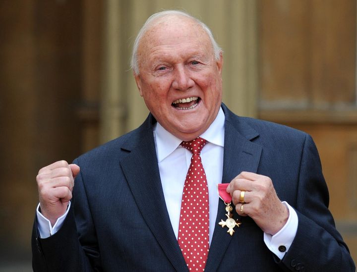File photo dated 22/03/12 of Stuart Hall after he was made an Officer of the British Empire (OBE) by Queen Elizabeth II at an Investiture ceremony in Buckingham Palace, London. Police investigating an allegation of rape and indecent assault have arrested the veteran BBC commentator Stuart Hall. The 82-year-old former It's A Knockout presenter was detained this morning, sources said.