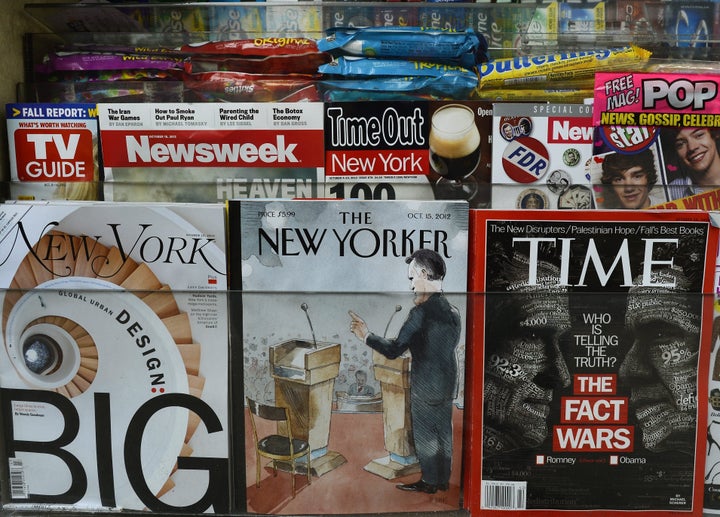 The New Yorker magazine's October 15 edition is diplayed in an Upper East Side newstand in New York on October 9, 2012. The New Yorker has created a cover illustration, titled “One on One,” by Barry Blitt of the first presidential debate between President Barack Obama and GOP opponent Mitt Romney that seems to be a parody of Clint Eastwood‘s speech involving an empty chair at the Republican National Convention. AFP PHOTO / TIMOTHY A. CLARY (Photo credit should read TIMOTHY A. CLARY/AFP/Getty Images)