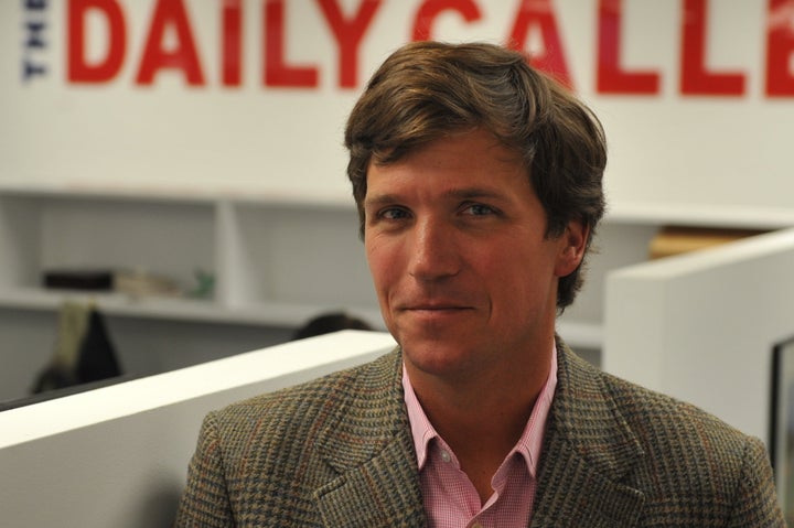 WASHINGTON, DC - JANUARY 7: Tucker Carlson, a conservative pundit, at the office of the new website, the Daily Caller, on January 6, 2010, in Washington, DC. The site, at which Carlson is the editor-in-cheif, has been branded as a 'conservative Huffington Post.' (Photo by Jahi Chikwendiu/The Washington Post via Getty Images)