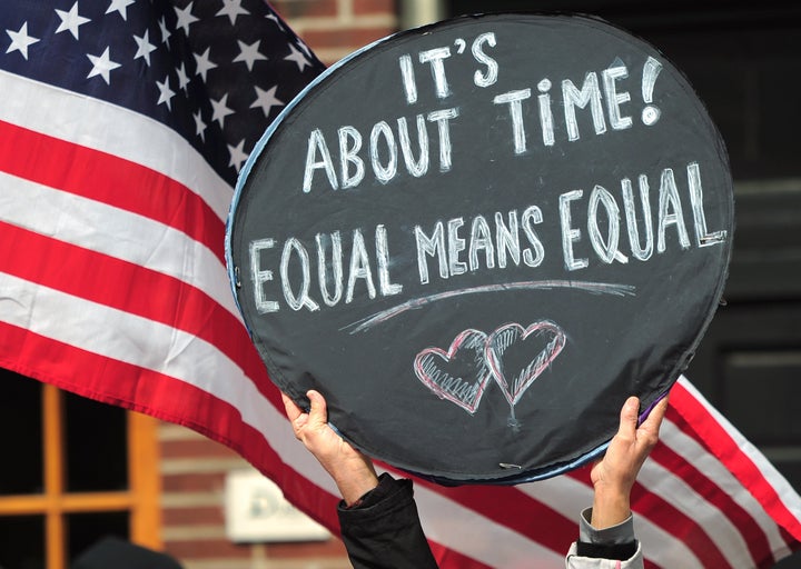 Marriage equality supporters take part in a march and rally ahead of US Supreme Court arguments on legalizing same-sex marriage in New York on March 24, 2013. The US Supreme Court will consider the divisive issue of legalizing same-sex marriage, in a hotly anticipated hearing on March 26 and 27 that could have historic consequences for American family life. The Supreme Court will hear oral arguments on two cases related to the right to marry. These two cases, which concern the discriminatory Defense of Marriage Act (DOMA) and California’s Proposition 8, are fundamentally about whether gay and lesbian Americans can enjoy the same freedoms and opportunities as everyone else. AFP PHOTO/Emmanuel Dunand (Photo credit should read EMMANUEL DUNAND/AFP/Getty Images)