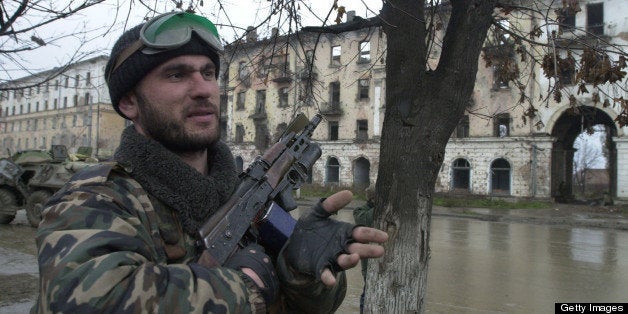 382535 12: A Russian soldier patrols in central Grozny November 23, 2000, capital of the breakaway republic of Chechnya. Russian forces have been accused of massive human rights abuses such as hostage-taking, beatings and executions against civilians, since beginning what Moscow calls an 'anti-terrorist' campaign to crush separatist Chechen rebels last fall. (Photo by Scott Peterson/Liaison)