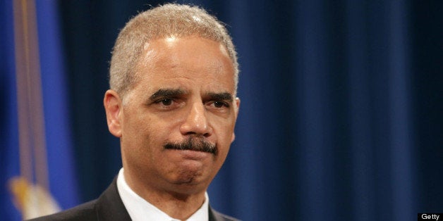 WASHINGTON, DC - MAY 14: U.S. Attorney General Eric Holder holds a Medicare fraud news conference at which he said he recused himself last year from a national security leak probe in which prosecutors obtained the phone records of Associated Press journalists at the Justice Department May 14, 2013 in Washington, DC. Holder faced a large number of questions about his department's investigation targeting phone records and data from the Associated Press. (Photo by Chip Somodevilla/Getty Images)